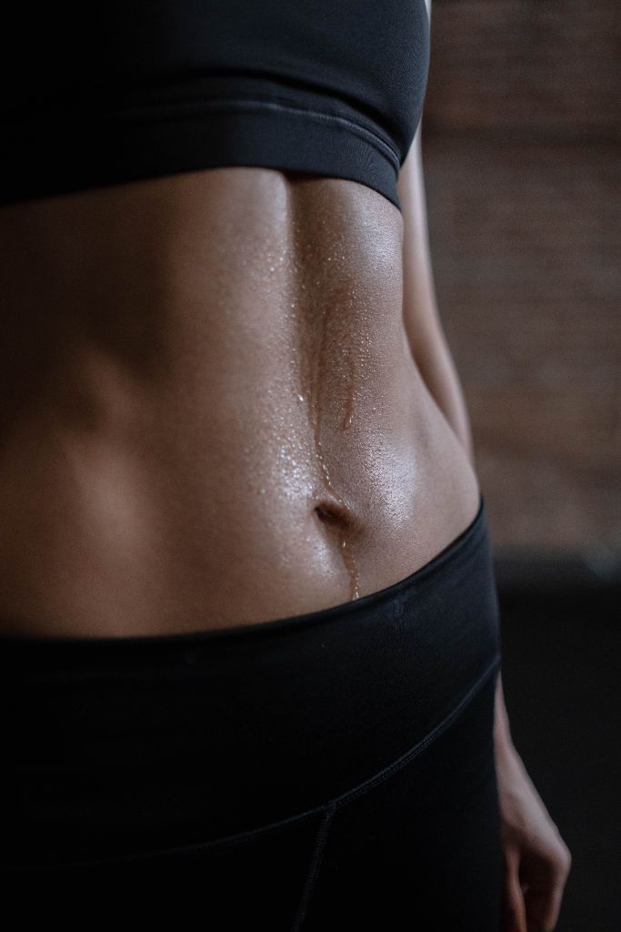 Athletic figure in low light